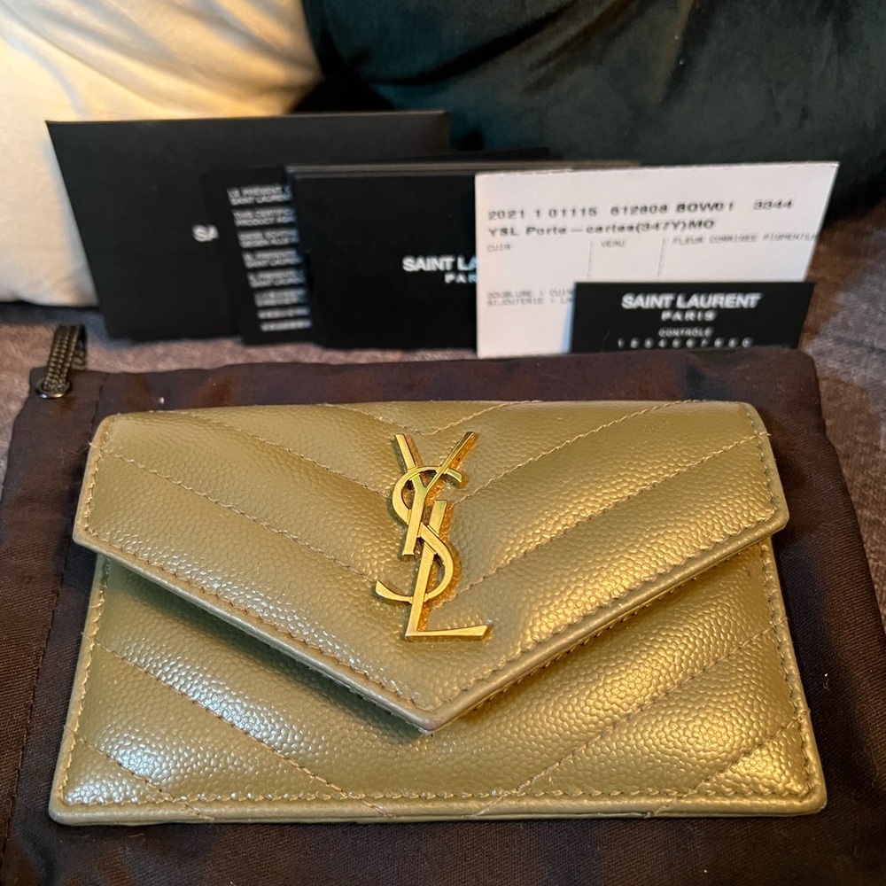 SOLD OFF POSHMARK 
Cassandre YSL Monogram Leather Zip Card Holder - Picture 2 of 16
